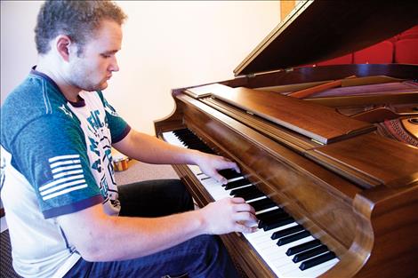 Josiah Pettit plays the piano. He plans to hold a concert benefitting the Ronan Bread Basket as his Eagle Scout Project. 