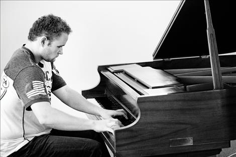 Josiah Pettit plays the piano. He plans to hold a concert benefitting the Ronan Bread Basket as his Eagle Scout Project. 