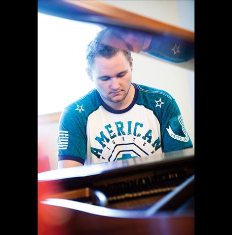 Josiah Pettit plays the piano. He plans to hold a concert benefitting the Ronan Bread Basket as his Eagle Scout Project. 