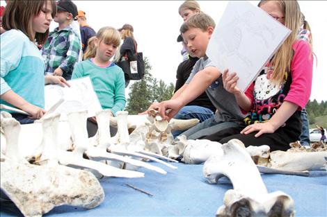 Valley View students examine a skeleton at the annual River Honoring ceremony. 