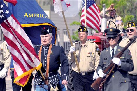 A color guard leads the Ronan parade.