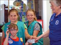 Girl Scouts donate money for shelter pups