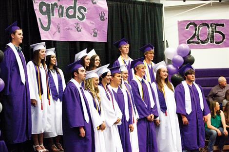 Charlo Class of 2015 pops confetti in celebration.