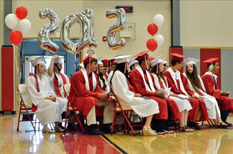 Karen Peterson photo Graduates prepare to receive their diplomas. 