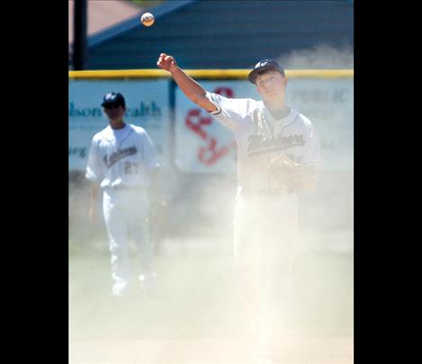  Jacob Harrod fields  a dusty ball during round one Sunday afternoon.