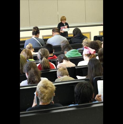 Students face a big audience during the poetry reading.