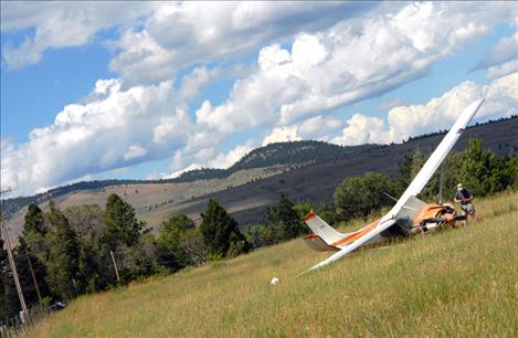 A pilot landed his plane in a field northwest of Polson after the engine failed Friday, June 19.