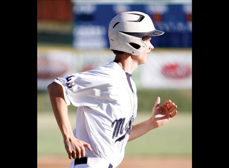 Derek Peel takes first base during the Mariners’ second round with the Glacier Twins last week.