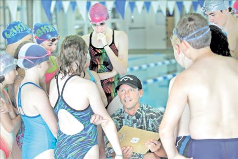 Coach Randy talks with the Lake Monsters after practice last week.