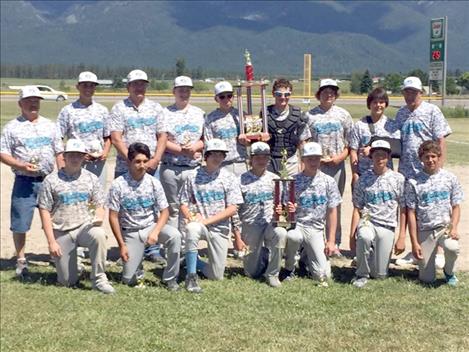The Ronan Warthogs show off their  championship trophy after wrapping up the Babe Ruth baseball season with a win over the Ronan Chiefs, on June 14 in Ronan.