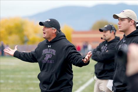 Assistant coach Randy Kelley reacts to an encroachment call against the Polson defense during the Laurel game Saturday.