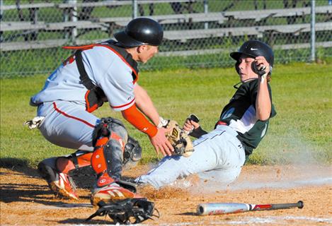 ake Young slides into home as a Mission Valley Mariner in 2010.