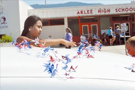 Elaina Wells, 13, prepares the One Voice Children’s Church. 