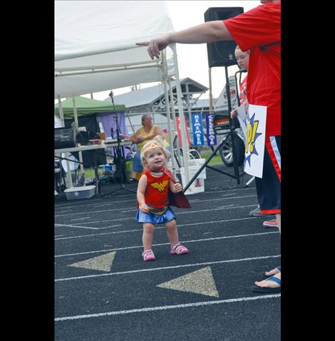 A tiny Wonder Woman fights back against cancer