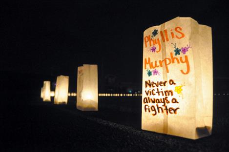 Luminaria memorials remind people of cancer’s impact. 