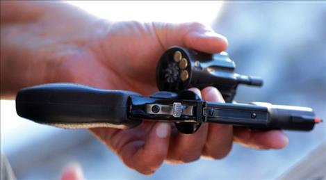 The Women on Target ladies learn about different styles of pistols.