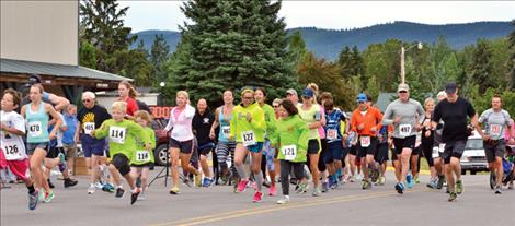 This year’s 98 runners  take off on the course.