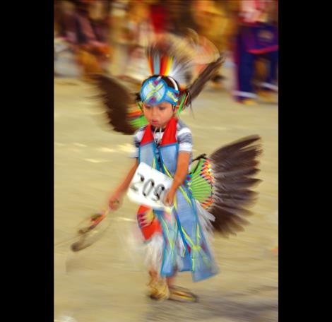 A young dancer twirls.