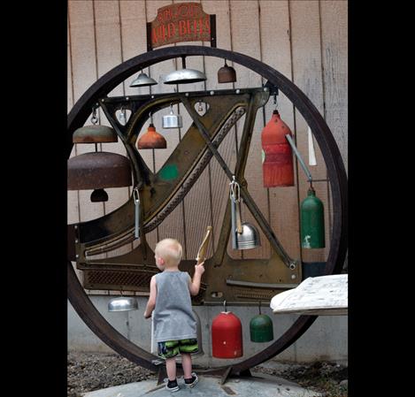 Wyatt Dunkerson, 2, plays the wild bells. 
