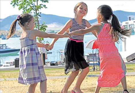 Grace Sorenson, Brooke Harding and Graci Hammer, from left, dance during Saturday’s  Showboat performances