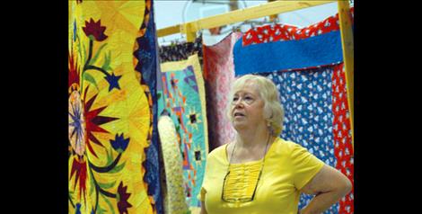 LaVon Grandy checks out the placement of her quilt at the Mission Mountain Quilt Guild show last year.