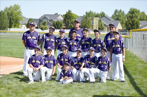 PNW 12U Cal Ripkin Regional Semifnalists proudly stand for a photo: Front row L-R: Espn Fisher, Alex Muzquiz, Xavier Fisher, Bat Boy Ryan Lake, Colter Wilson, Jarrett Wilson, Trent Wilson. Back row L-R: Coach Brad Fisher, Trevor Lake, Ethan McCauley, James Bennett, Coach Tim Lake, Dylan Wisniewski, Lincoln Slonaker, Coach Tony Muzquiz, William Hameline.