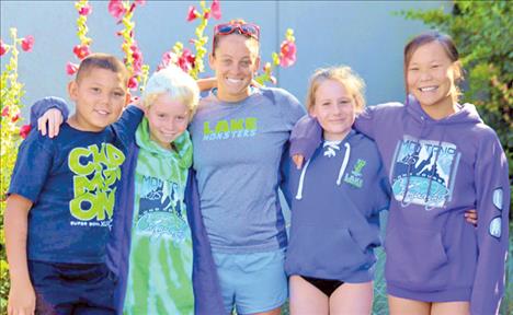 Lake Monsters Jeremiah Coutts, Sean Murphree, both 10, aquatic director and coach Ali Bronsdon, Hannah Simpson, 9, and Ajalin Simshaw, 12, traveled to Bozeman for the Long Course State swim meet July 31 through Aug. 2.