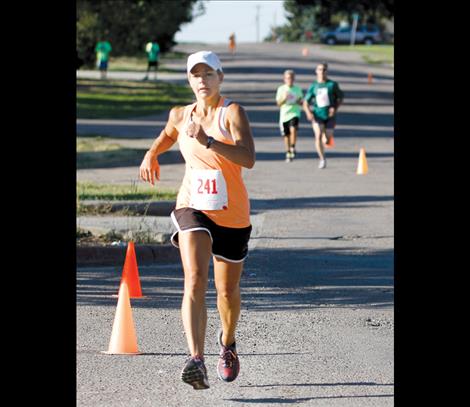 Noelle Decker finishes the 5K in third place.