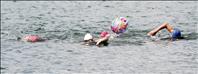 Swim team crosses Lake Mary Ronan