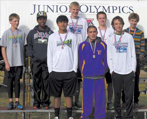 Donovan McDonald (third from left) stands in the winners' circle with other runners from around the state. McDonald ran against sophomores and juniors from all over Montana during competition. 