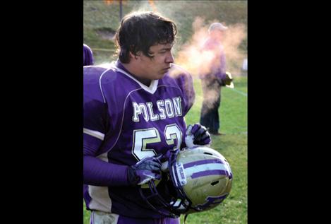 With temperatures staying below  freezing, Taylor Pitts heads to the sidelines as Saturday’s contest comes to a close.