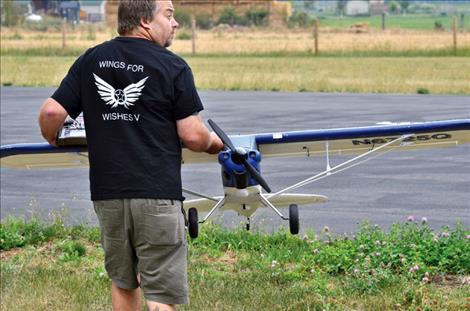 Brian Lepinski takes his airplane to the runway. 