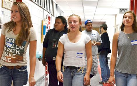 Freshmen students arrive at Arlee High School for orientation. 