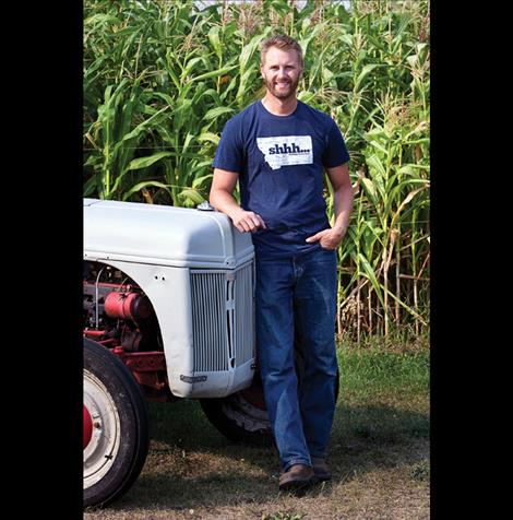 Pastor Phillip Neuharth stands at the entrance of the Glacier View Chriistian School’s corn maze. 