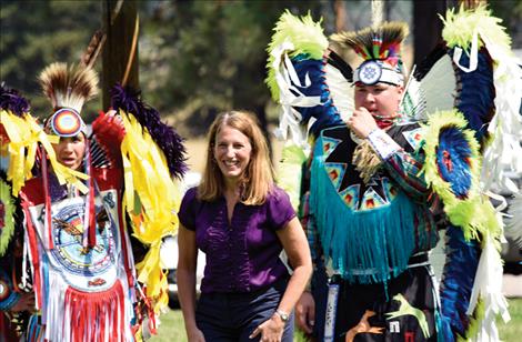 Health and Human Services Secretary Sylvia Burwell learns a round dance as part of her visit to the People’s Center on Aug. 18.