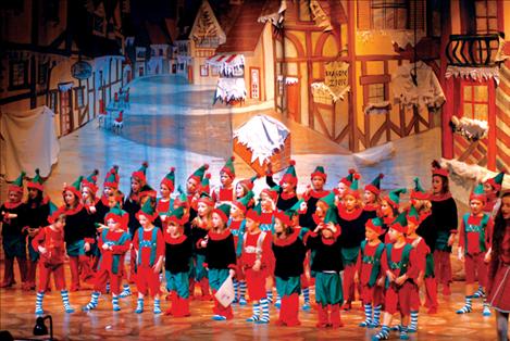 Tiny elves fill the Ronan Performing Arts Center stage Friday evening for the premiere performance of “Mrs. Claus is Missing.”