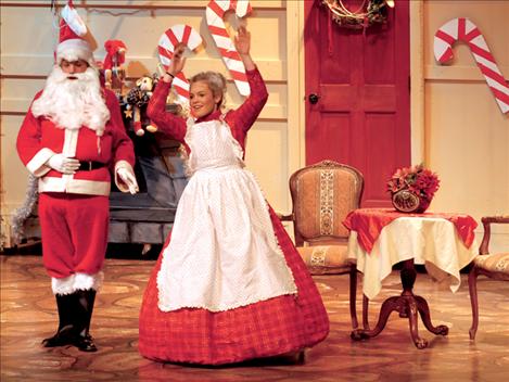 Santa and Mrs. Claus, portrayed by Bradly Findly and Carsten Rhine, perform a duet as they look forward to Christmas. The musical production took place Friday and Saturday evenings.