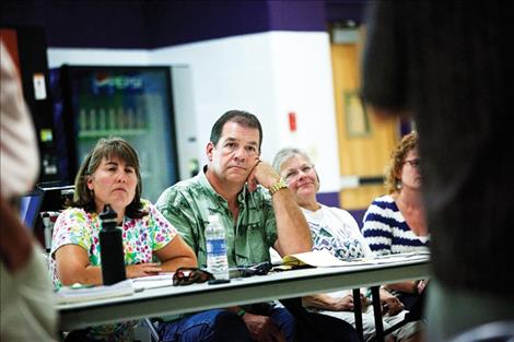 Members of the Polson Economic Development Council listen to public comment during a meeting on a proposed resort tax last week.