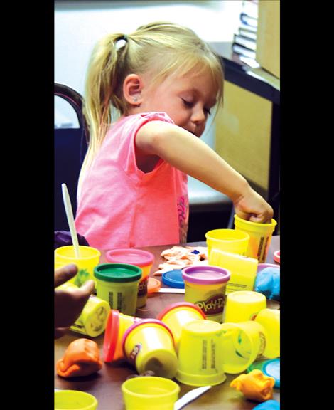 Kids get into the act at Fresh SNAP food preserving classes by making some Play-Doh “foods.”