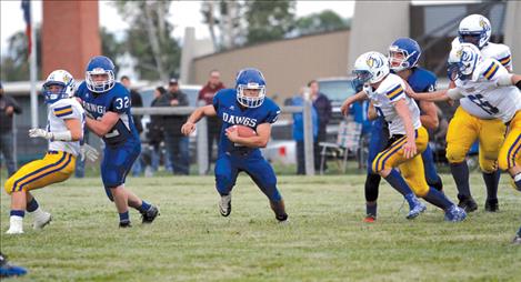 Mission senior  Israel Umphrey finds an  opening  during the Bulldogs’ game against Thompson Falls Friday night.