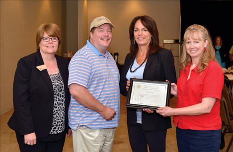 SAFE Harbor recently received a Program Highlight award from the Montana Board of Crime Control for their effectiveness in addressing public safety-related issues. Pictured from left are: Tina Chamberlain, MBCC Program Specialist; Dana Grant, SAFE Harbor; DeeAnn Richardson, Executive Director, SAFE Harbor; Laura Obert, MBCC Board of Directors Chair.