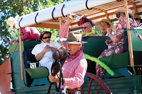 Jake Jacobson whooped it up for his part in a stagecoach robbery melodrama during the annual Dayton Daze event.