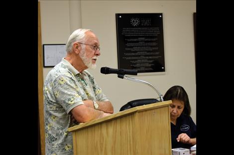 Paul Laisy, retired Missoula  Rural Fire Chief, speaks to the commissioners about the fire department split.