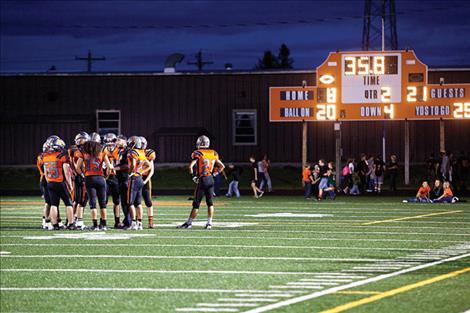 The Ronan Chiefs huddle during the second quarter of last Friday’s game. 