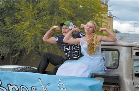 Freshmen Brock Tomlin and Taylor McCready flex for the crowd. 