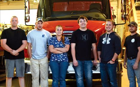 New Polson Rural firefighters Rob Herreid, left, Chris Moldenhauer, Shondra Thorsted, Wyatt Barr, Nick Burns and Jonathan Gray sign up to work with the Polson Rural crew. 