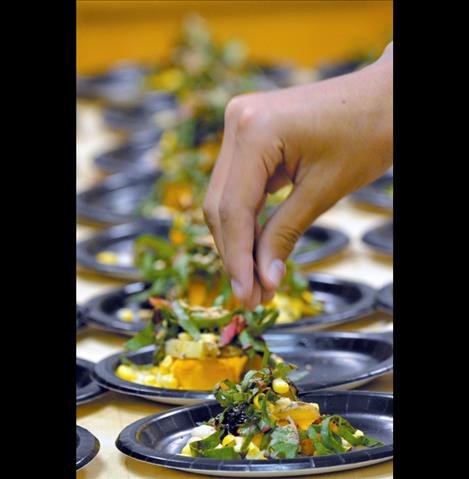 Students helped layer the Three Sister Salad.