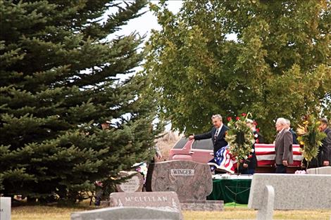  The coffin carrying Justice Jean Turnage is carried to his final resting place.