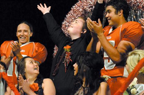 Homecoming King Darren Marks  celebrates  his victory