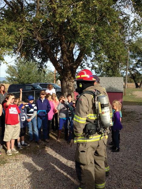 Firefighters visit Valley View School to teach students about fire safety.